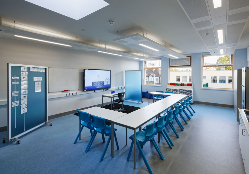 The building’s classrooms, hall and dining areas are naturally ventilated using passive stack ventilation. Roof-mounted wind driven ventilation terminals in the hall and dining room are designed to 'capture' prevailing wind and direct it via four separate chambers within the terminal to the space beneath. The building achieved a BREEAM ‘Excellent’ rating.