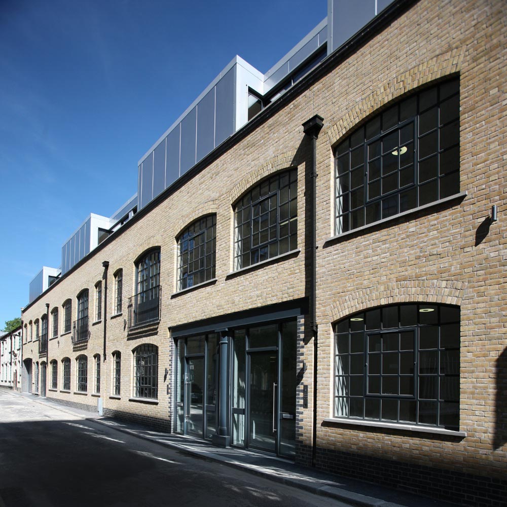 The office building in Camden is headquarters for an International IT company. We completed detailed design works for the shell & core and Category A fit out of the existing 1,200m² space. The offices are set out over 3 floors and designed as flexible workspace, including a new basement level; complete with new state-of-the-art infrastructure and IT systems. The building services included soil & waste, boosted cold water, hot water, ventilation, comfort cooling, controls, electrical distribution, lighting, small power, fire alarms, security and structured wiring.