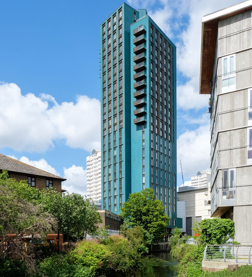 Mapleton Crescent is a 27-storey tower situated on a constrained triangular site next to River Wandle.  The award-winning project comprises of 63 one-bed, one-person affordable homes and 23 larger for sale apartments - five homes per floor making up two sides of the triangular plan, all clustered around a naturally lit and ventilated core. Each resident has access to shared amenity spaces such as communal lounge spaces, rooftop gardens, balconies and the riverside terrace.