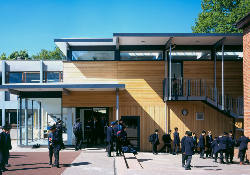 The new-build art studio for Queen Elizabeth's School slots into a narrow gap between two existing blocks.  A large skylight in the new extension enables borrowed light to filter into the existing art studio alongside it. Directly below, a gallery is set behind fully glazed walls where pupils can display their artwork. We provided all mechanical and electrical services.