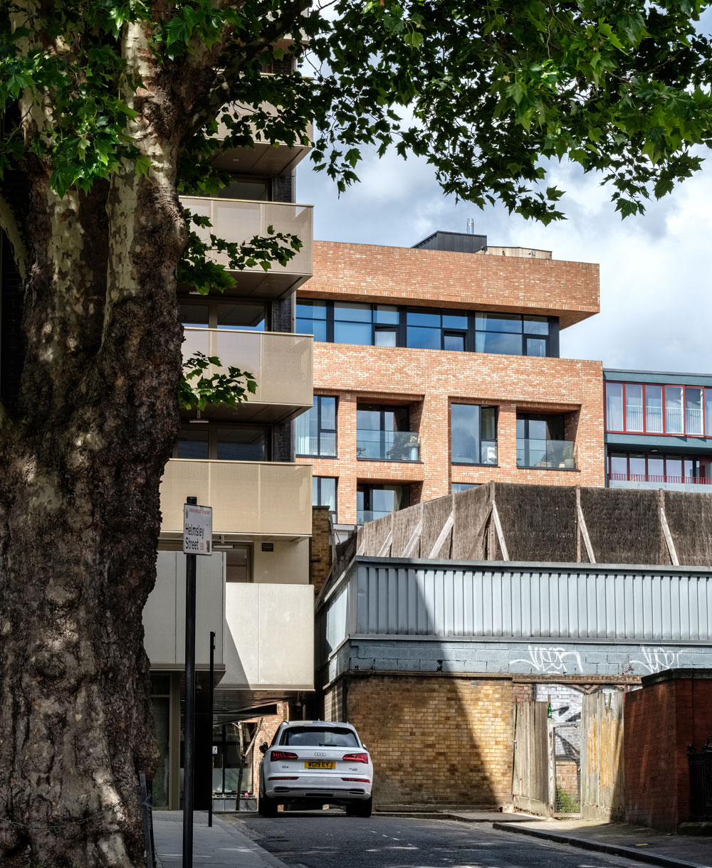 The Warehaus project consists of 30 residential units, seven ground floor duplex studio spaces, a rooftop garden and swimming pool. Due to the local industrial buildings and railway line, the building was envisaged as a solid and powerful form by using only bricks and a deep facade. The glass bottomed swimming pool on the roof, gives the atrium natural daylight adding to the internal artwork created by artist and illustrator, Kerry Lemon. We provided all mechanical and electrical services for the project.