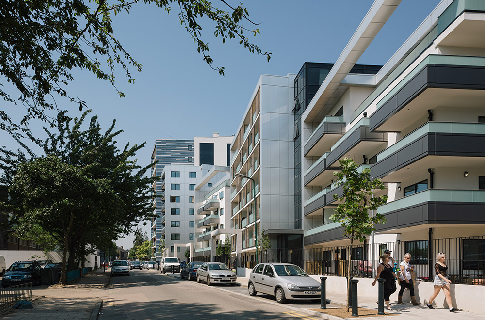 Watling Place is the first phase of the 48-acre £600 million masterplan to regenerate South Kilburn and build nearly 1,700 new homes. The 113 affordable, 20 shared ownership and 20 private sale apartments alternate lower and higher rise structures along a narrow railway-side site. The 11-storey blocks on Albert Road are clad in an Italian porcelain clay composite rain screen, have generous balconies, landscaped courtyards, communal gardens with play areas all within a tight budget. The project has photovoltaic panels, triple glazed windows, green roofs and meets Code for Sustainable Homes 4. We provided all mechanical and electrical services.